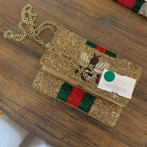 Monkee’s Gold Crossbody Bag